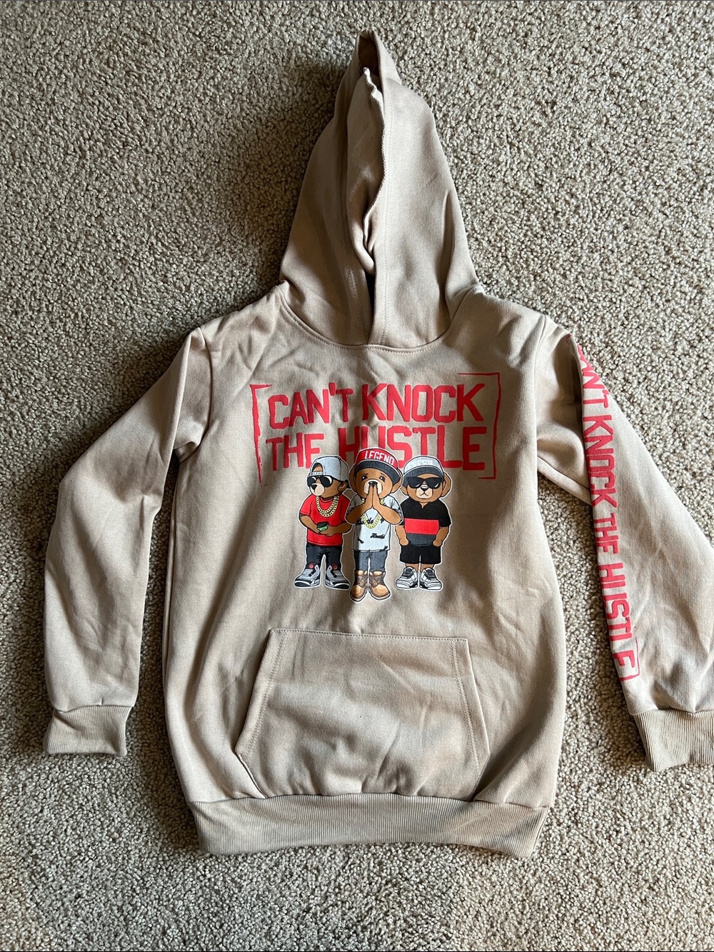 Kids Beige Hoodie with 'Can't Knock The Hustle' Graphic